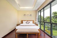 Ocean Villa Pool Retreat In Da Nangにあるベッド