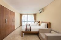 Ocean Villa Pool Retreat In Da Nangにあるベッド