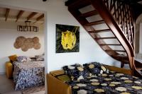 Llit o llits en una habitaci&oacute; de Les Flamboyants jaunes