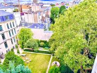 an aerial view of a park in a city at Cosy place in Paris in Paris