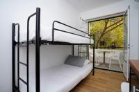 Postel nebo postele na pokoji v ubytování Alameda Guesthouse by Boutique Taipas Garagem para motos