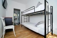 Postel nebo postele na pokoji v ubytování Alameda Guesthouse by Boutique Taipas Garagem para motos