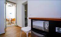 TV a/nebo společenská místnost v ubytování Alameda Guesthouse by Boutique Taipas Garagem para motos