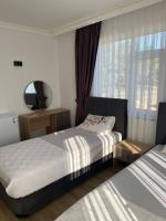 Postel nebo postele na pokoji v ubytování Asimado Hotel