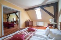 Postel nebo postele na pokoji v ubytování LD PALACE Spa & Kur