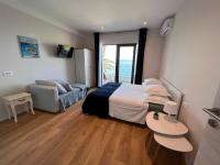 Posteľ alebo postele v izbe v ubytovaní Beachfront Comfort Apartments SINAJKO