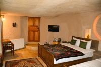 TV a/nebo společenská místnost v ubytování My Story Cave Hotel