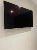 Telewizja i/lub zestaw kina domowego w obiekcie Loft atlantique Rochefort