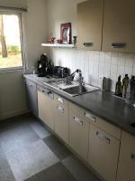a kitchen with a sink and a counter top at Appartement T2 Manoir de Malville in Nantes