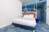 Posteľ alebo postele v izbe v ubytovaní The Ruck Hotel