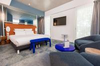 Posteľ alebo postele v izbe v ubytovaní The Ruck Hotel