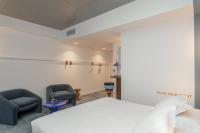 Posteľ alebo postele v izbe v ubytovaní The Ruck Hotel