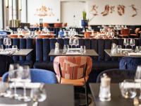 Reštaurácia alebo iné gastronomické zariadenie v ubytovaní The Ruck Hotel