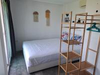 Postel nebo postele na pokoji v ubytování Juliet Home Samui - Adult only