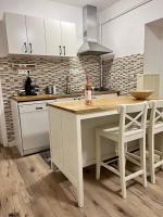 Kuchnia lub aneks kuchenny w obiekcie Pataky Apartmanok