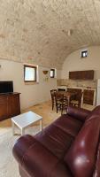 A television and/or entertainment centre at Vacanza In Puglia