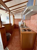 Kuchyň nebo kuchyňský kout v ubytování Apartments Aniko Šarić