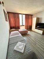 Postel nebo postele na pokoji v ubytování Apartments Aniko Šarić