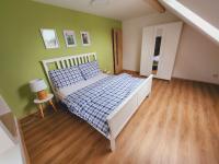 Postel nebo postele na pokoji v ubytování Apartmány u Koláčků