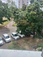 a group of cars parked in a parking lot at Joli appartement proche métro in Lyon