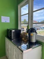 Kuchyň nebo kuchyňský kout v ubytování Sabai Sabai Poshtel & Motorbike Rental