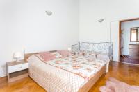 Postel nebo postele na pokoji v ubytování Apartment Mirca 732b