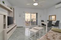 Televízia a/alebo spoločenská miestnosť v ubytovaní Apartamento Familiar Torrox A65