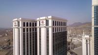 a view of a tall building in a city at Doubletree By Hilton Jabal Omar Makkah in Makkah