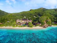 an aerial view of a resort on a beach at DoubleTree by Hilton Seychelles Allamanda Resort & Spa in Takamaka