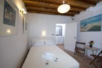 Posteľ alebo postele v izbe v ubytovaní Hibiscus Rosa Mykonos