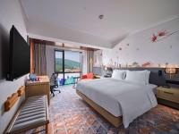 Hilton Garden Inn Guangzhou Tianheにあるテレビまたはエンターテインメントセンター