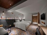 Hilton Garden Inn Guangzhou Tianheにあるテレビまたはエンターテインメントセンター
