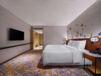 Hilton Garden Inn Guangzhou Tianheにあるベッド