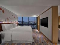 Hilton Garden Inn Guangzhou Tianheにあるベッド