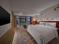 Hilton Garden Inn Guangzhou Tianheにあるベッド
