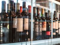 a bunch of bottles of wine on a shelf at AR Diamante Beach & SPA Hotel 4 SUP in Calpe