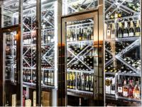 a room filled with lots of bottles of wine at AR Diamante Beach & SPA Hotel 4 SUP in Calpe