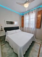 Posteľ alebo postele v izbe v ubytovaní Apartamento Completo Plaza de las Tendillas - Párking Privado - Alojamientos El Duque