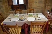 a table with a white table cloth on it at Casa Atenea in Zamora