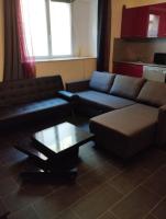 a living room with a couch and a coffee table at Appartement T2 Brest Pilier Rouge avec internet in Brest