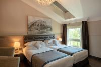 Posteľ alebo postele v izbe v ubytovaní Hotel Il Corazziere