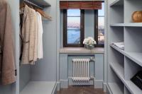 a walk in closet with a window and a radiator at Hilton Molino Stucky Venice in Venice