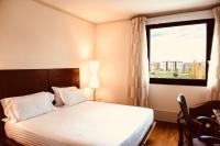 Łóżko lub łóżka w pokoju w obiekcie Hilton Garden Inn Florence Novoli