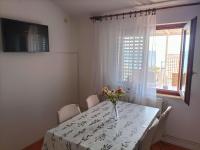 Televízia a/alebo spoločenská miestnosť v ubytovaní Apartment Zdenka 1