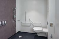 a bathroom with a toilet and a shower stall at Hampton By Hilton Toulouse Airport in Blagnac