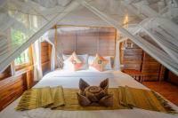 Postel nebo postele na pokoji v ubytování Koh Jum Resort