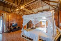 Postel nebo postele na pokoji v ubytování Koh Jum Resort
