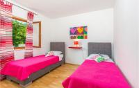Posteľ alebo postele v izbe v ubytovaní 3 Bedroom Cozy Home In Veprinac