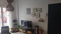 Televízia a/alebo spoločenská miestnosť v ubytovaní le J&J Appartement spacieux climatisé en centre ville