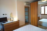 A bed or beds in a room at Casa Tonia